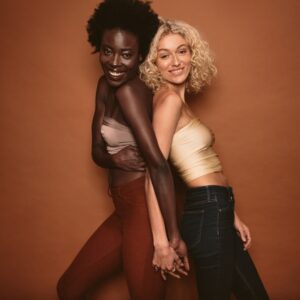 Photo of two women smiling and posing